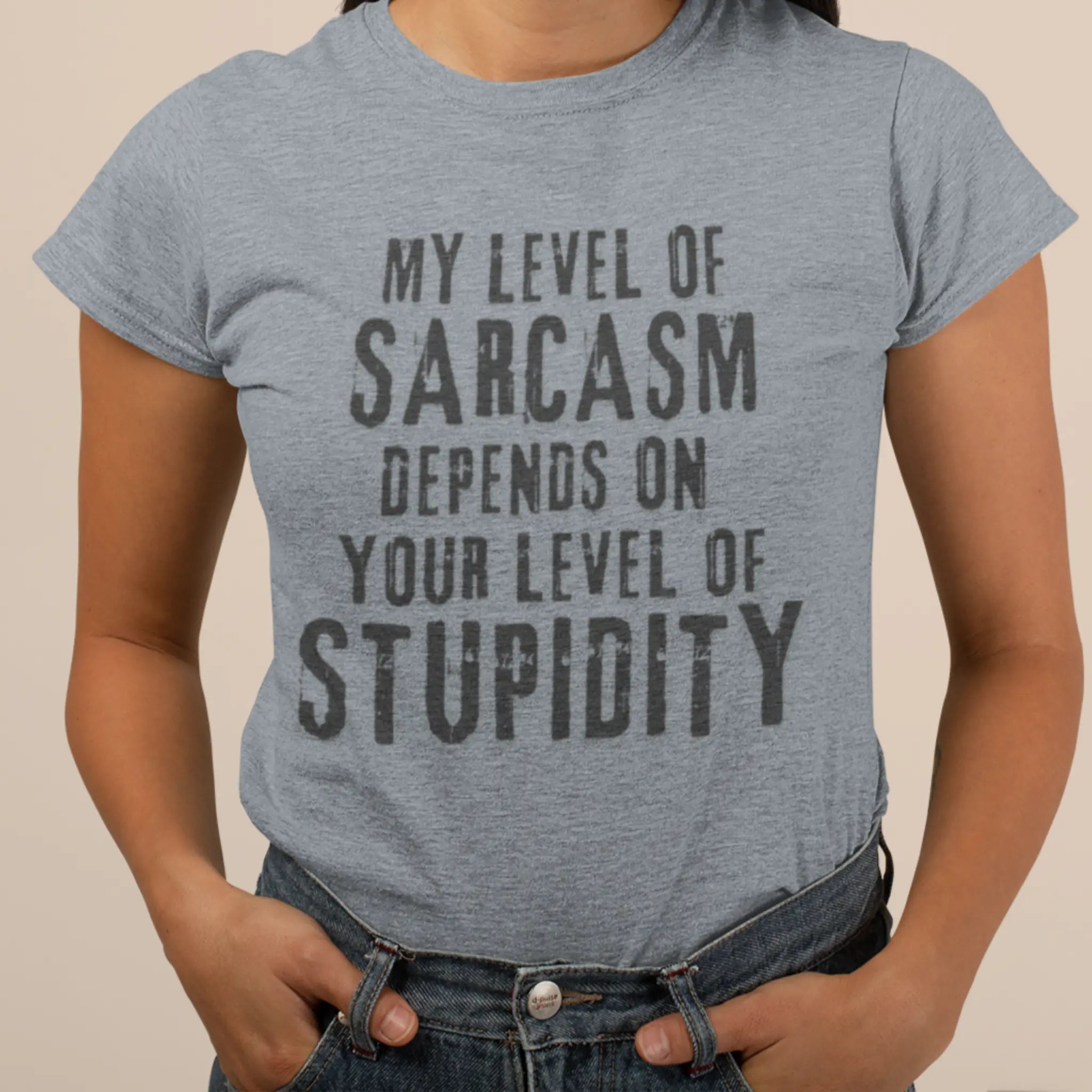 Woman wearing heather gray "My Level Of Sarcasm Depends On Your Level Of Stupidity" t-shirt - funny sarcastic tee for people with zero tolerance for stupidity