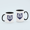 black 'Mama Bear' ceramic coffee mug with bold bear graphic, available in 11 oz and 15 oz sizes, featuring a durable two-tone design.
