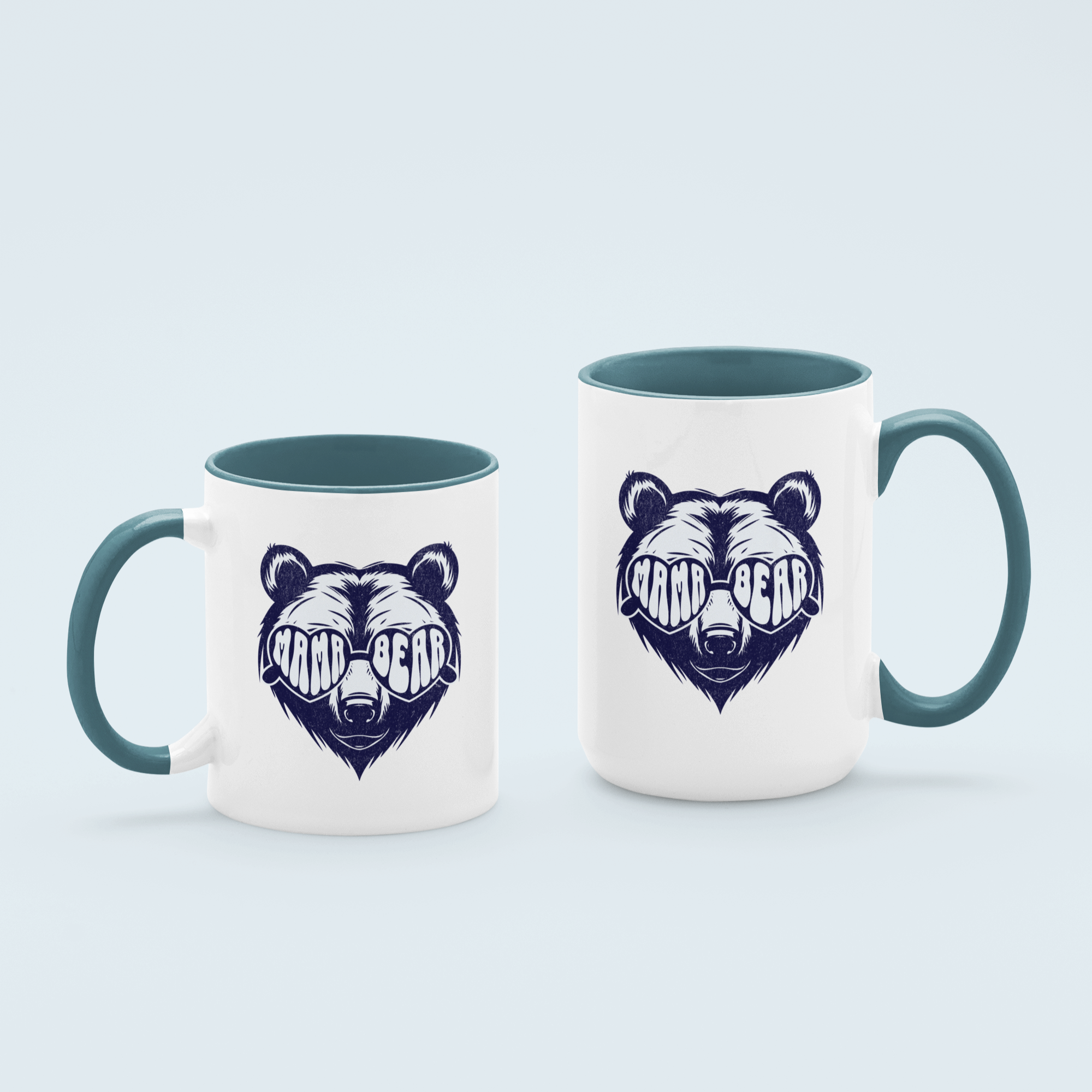 Blue 'Mama Bear' ceramic coffee mug with bold bear graphic, available in 11 oz and 15 oz sizes, featuring a durable two-tone design.