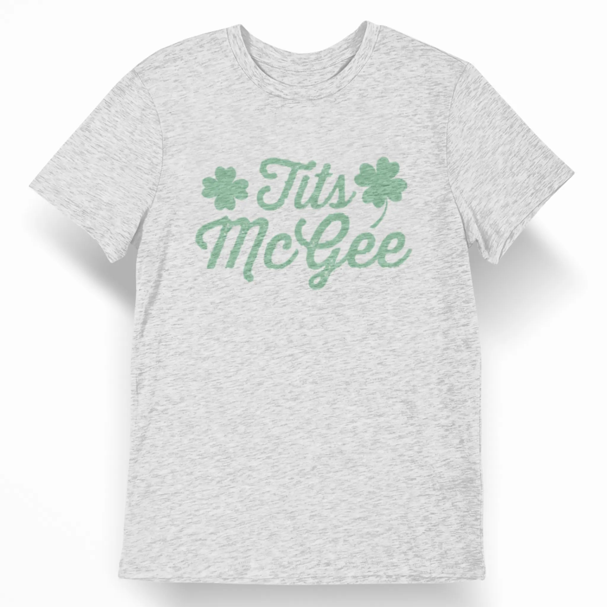 St. Patrick’s Day funny saying shirt with green “Tits McGee” text and shamrocks on a white t-shirt
