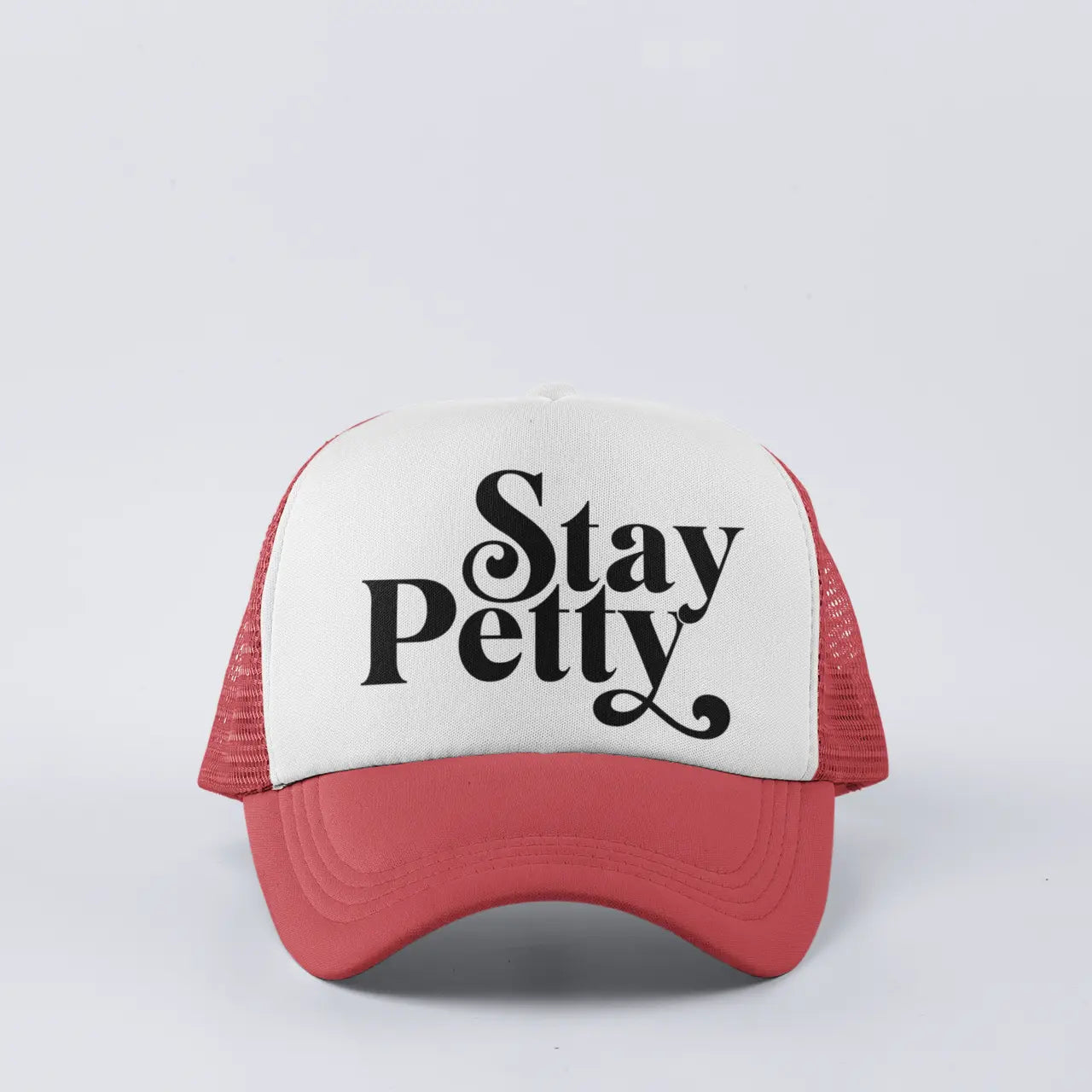 Lifestyle shot of "Stay Petty" trucker hat - perfect petty attitude snapback for side-eye moments and clapbacks
