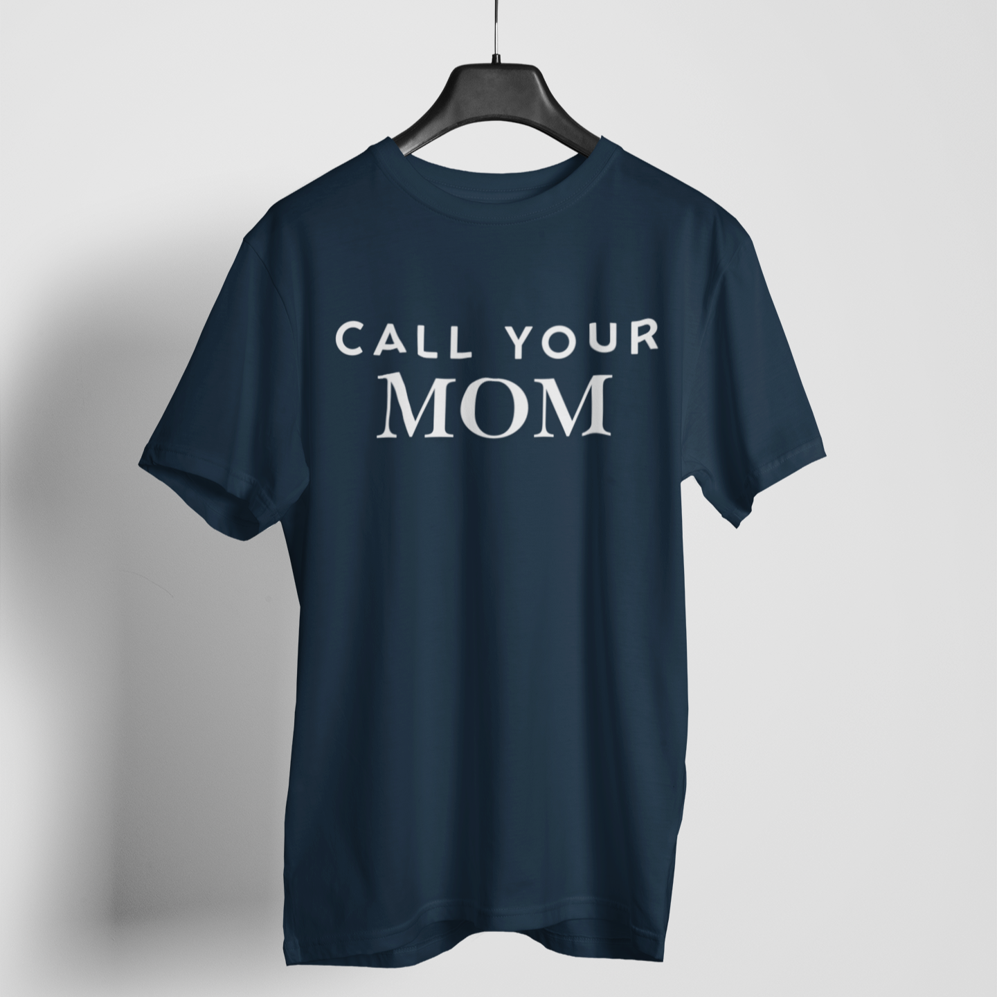Call Your Mom' navy blue t-shirt with bold lettering, a snarky and funny reminder to check in.