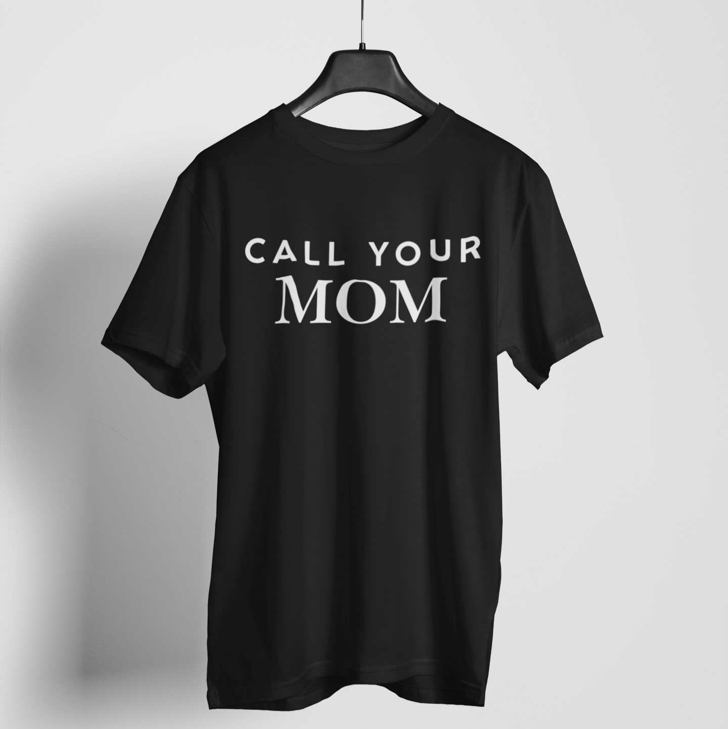 Call Your Mom' black blue t-shirt with bold lettering, a snarky and funny reminder to check in.