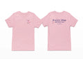 Pink t-shirt with floral design on front and text on back, on a white background