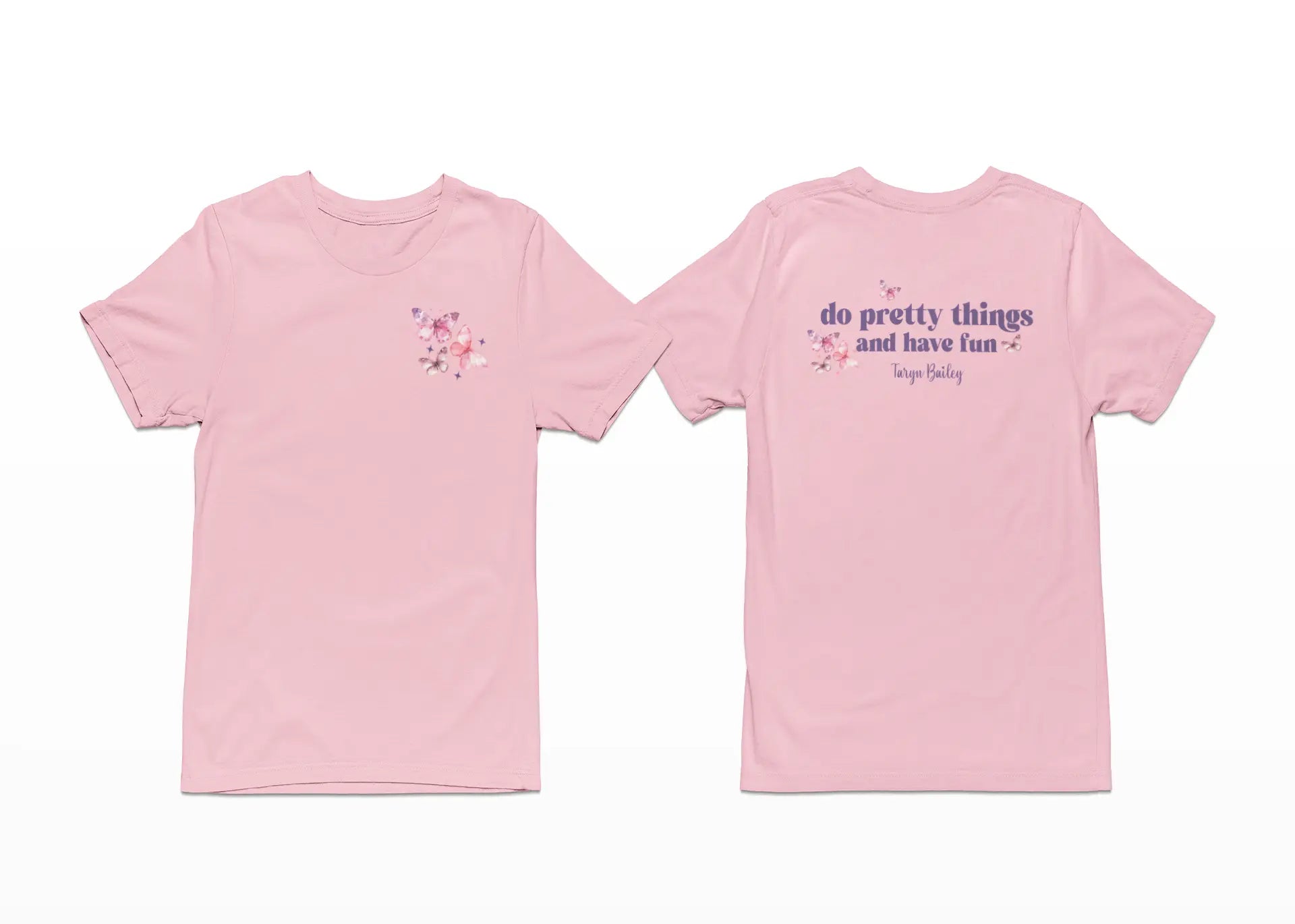 Pink t-shirt with floral design on front and text on back, on a white background