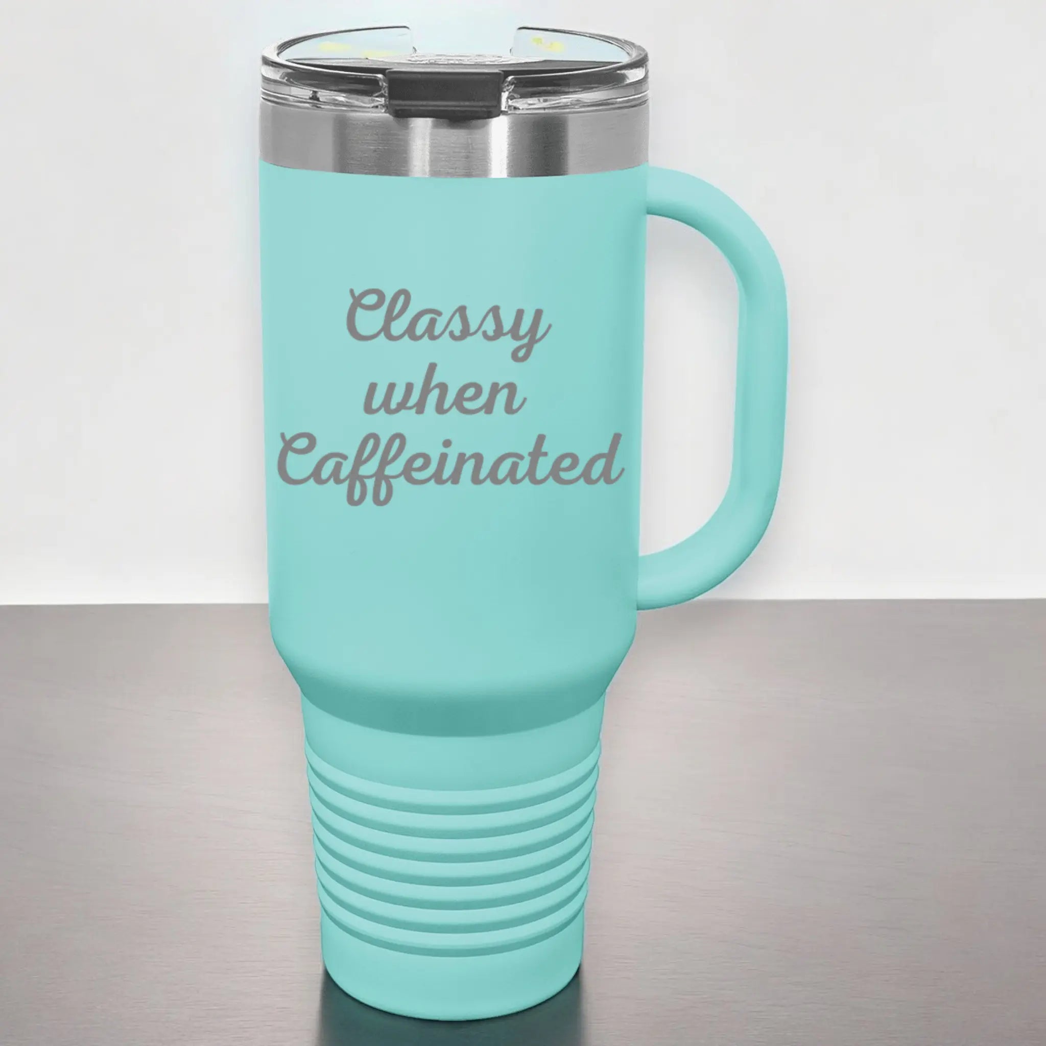 Angle view of 40oz laser engraved "Classy When Caffeinated" tumbler green with handle - insulated stainless steel cup keeps coffee hot for hours