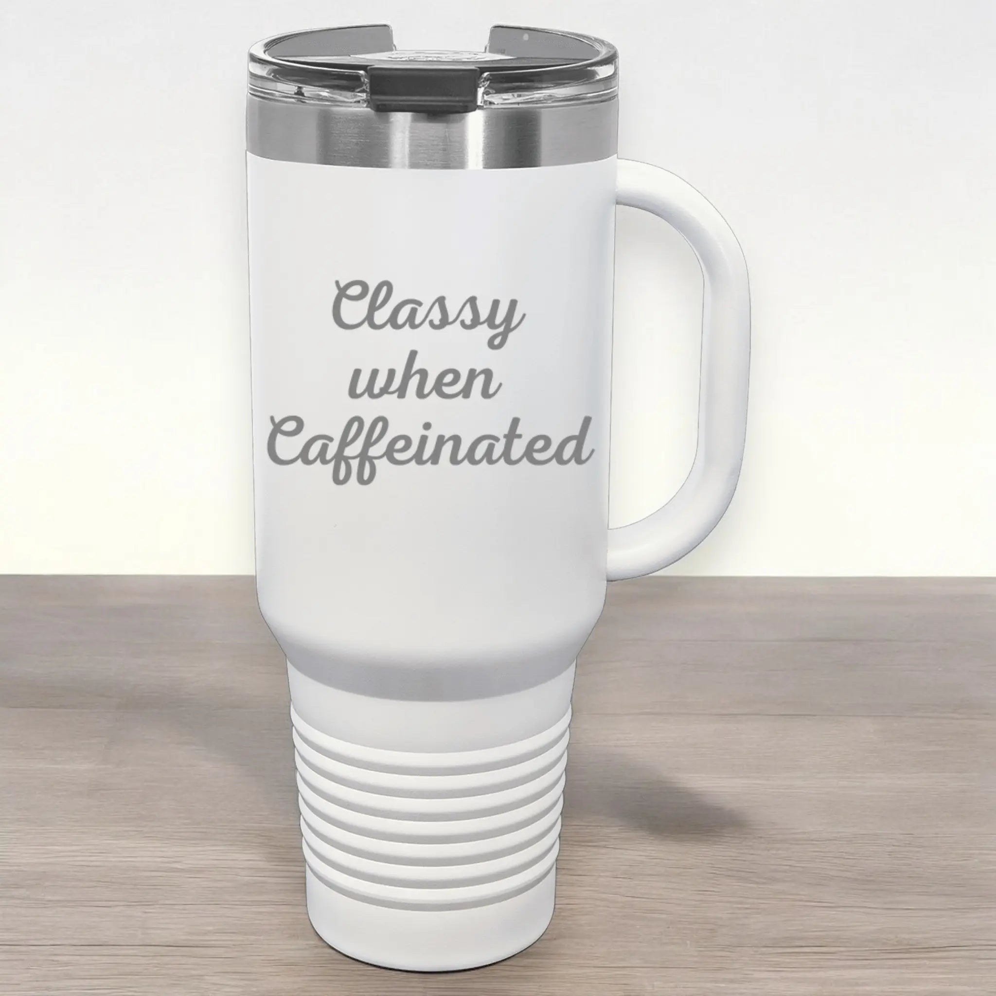 Detail shot of 40oz laser etched "Classy When Caffeinated" tumbler green - showcasing elegant engraving on insulated coffee cup