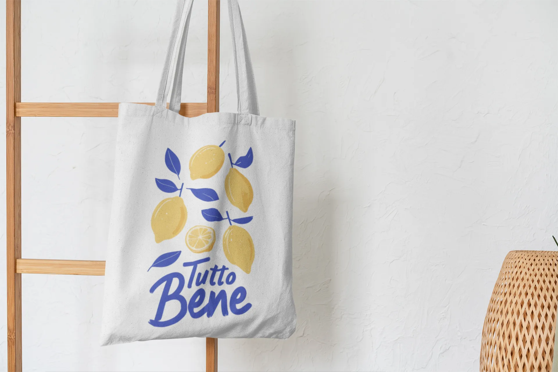 Tote bag with lemon design and 'Tutto Bene' text on a white background